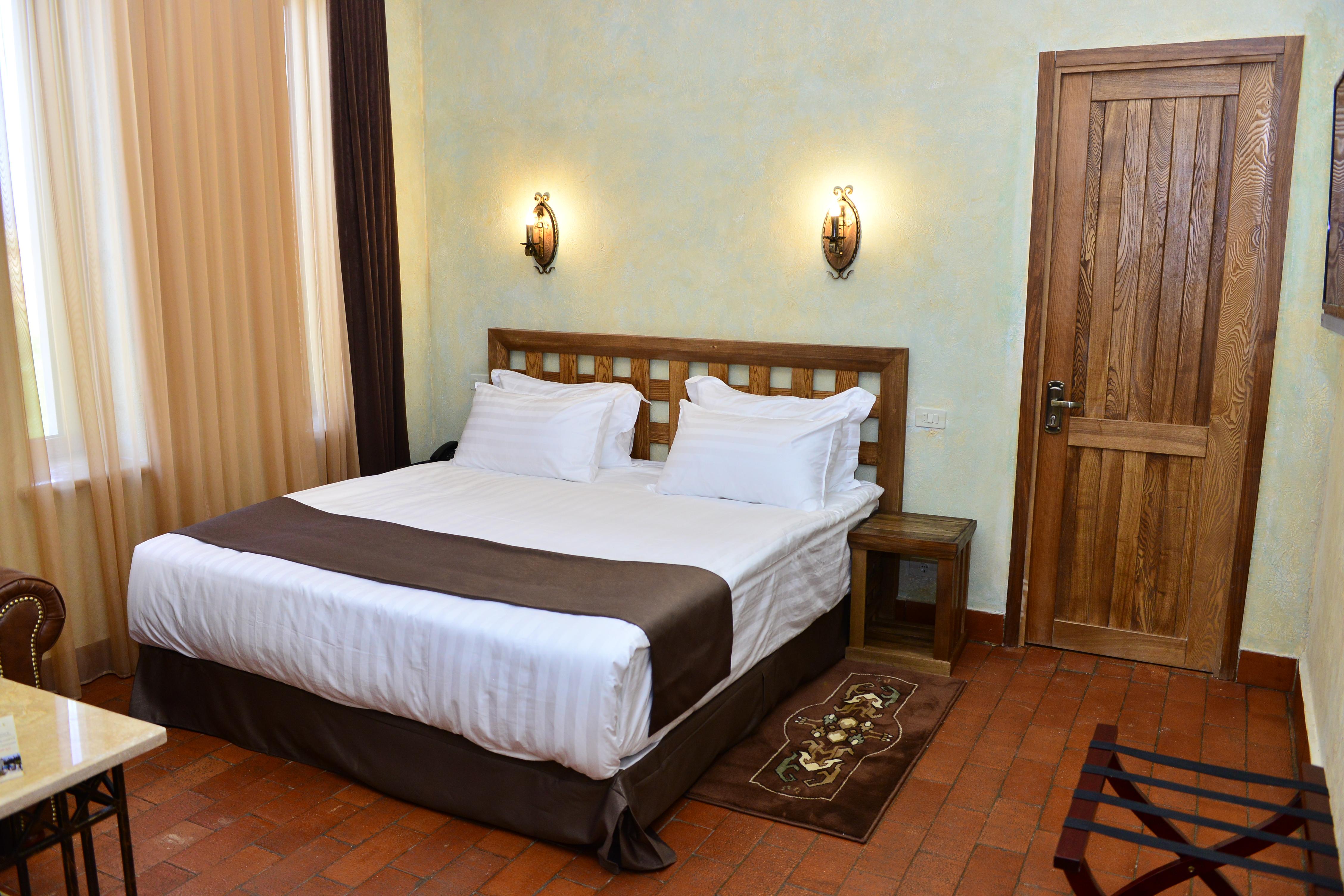 Caucasus Hotel Kasagh Eksteriør bilde A bedroom at the hotel